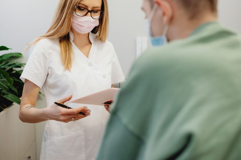 Medical staff at a doctor’s office reception desk